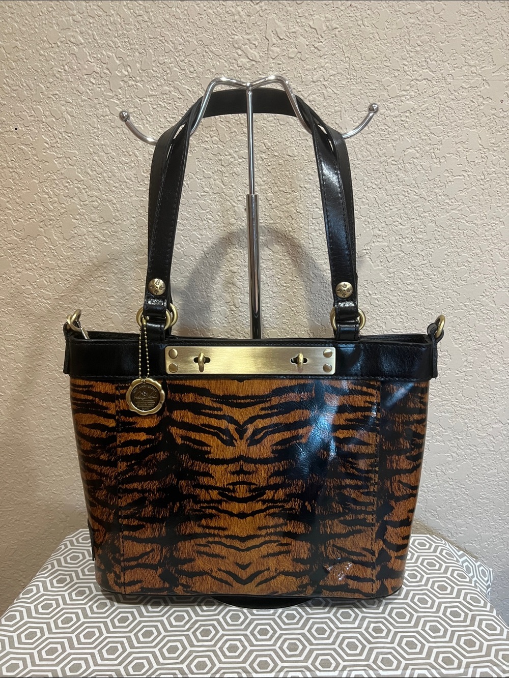 Patricia Nash Tiger-Print Patent Tote with Black Trim and Gold Hardware